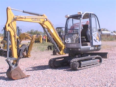 gehl 373 mini excavator|gehl skid steer attachments.